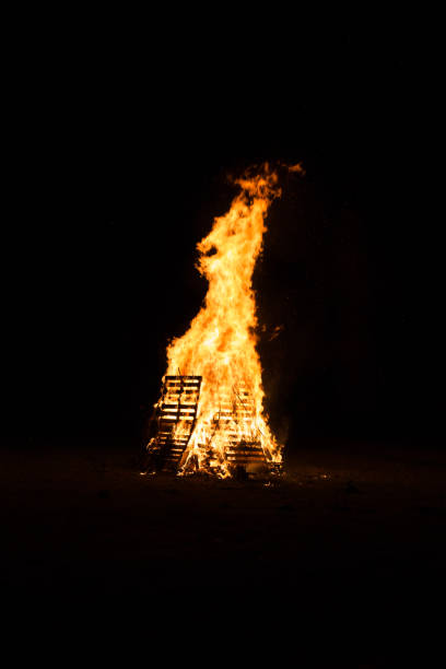 istock Embers fire fireplace grill fire flame, black background 667984550