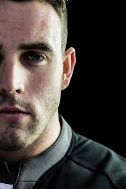 istock Tough rugby player looking at camera 667985972