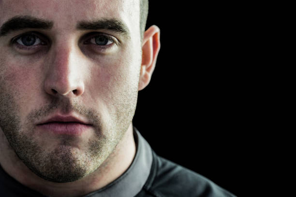 istock Tough rugby player looking at camera 667986068