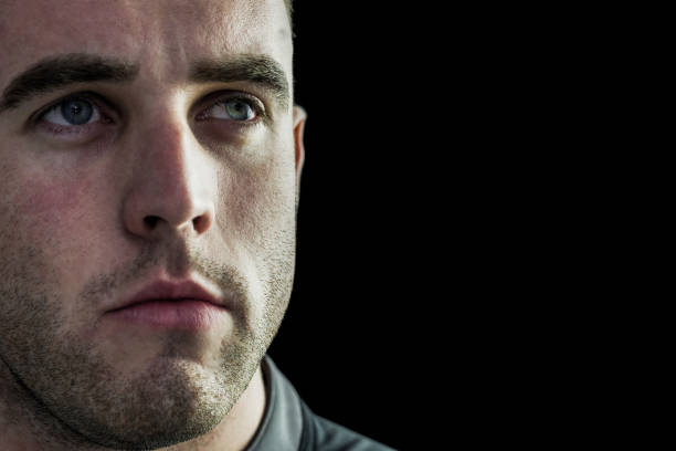 istock Tough rugby player looking away 667986172