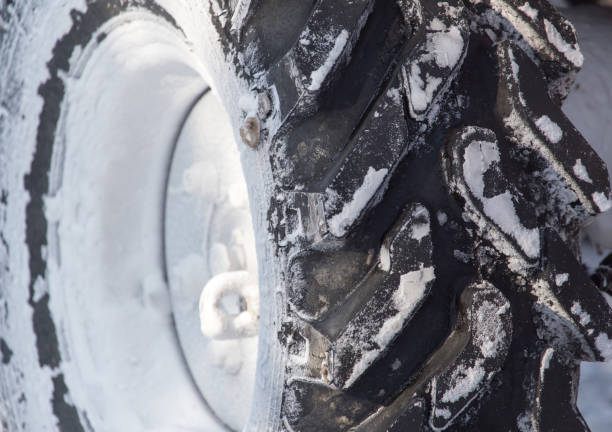 istock tractor wheel in the snow 667996780