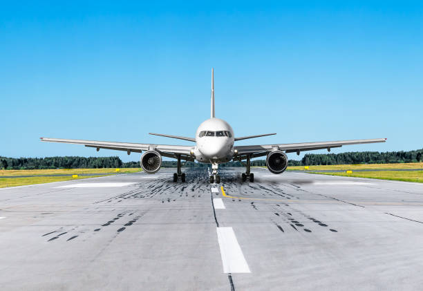 istock Plane on the runway asphalt road and blue sky 668003098