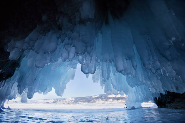 istock ice cave, Lake Baikal. Winter landscape 668009968