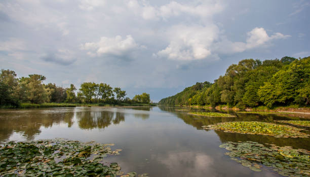 Thunderstorm mood and still water The calm before the storm gewitter stock pictures, royalty-free photos & images