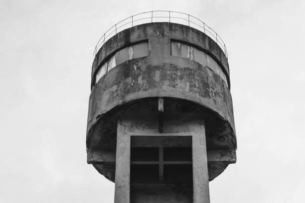istock Old soviet water tower blue color in City. 668013140