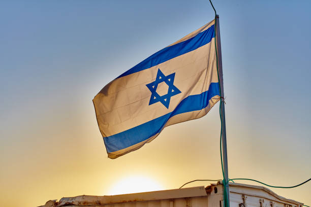 istock Israel flag at sunset 668016976