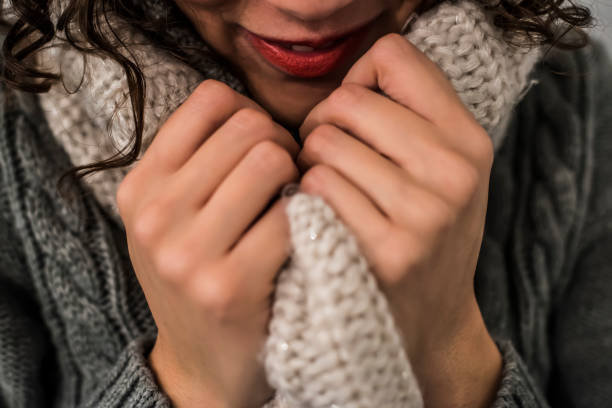 istock girl with wool scarf 668023126