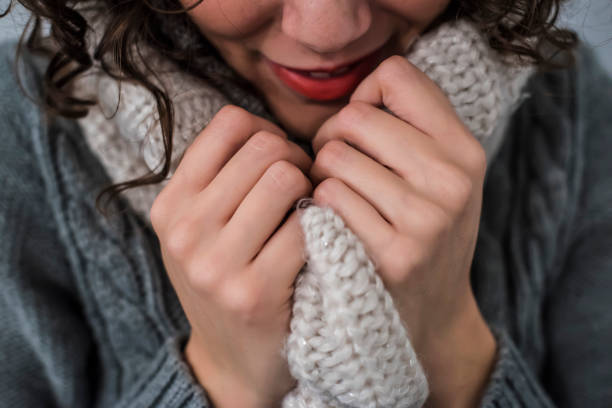 istock girl with wool scarf 668023130