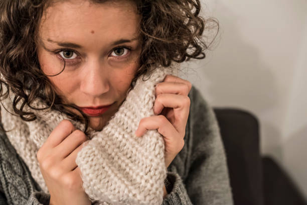 istock girl with wool scarf 668023132