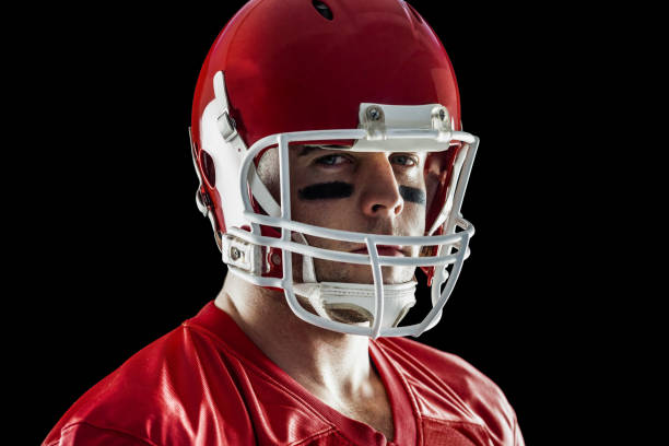 istock American football player looking at camera 668030060