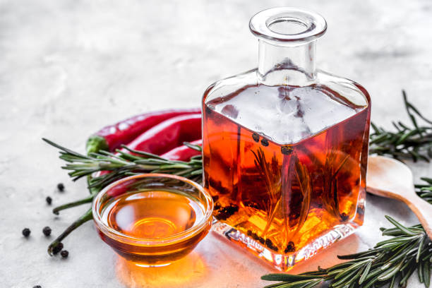 istock natural oils concept with fresh chili paper on table background 668031636