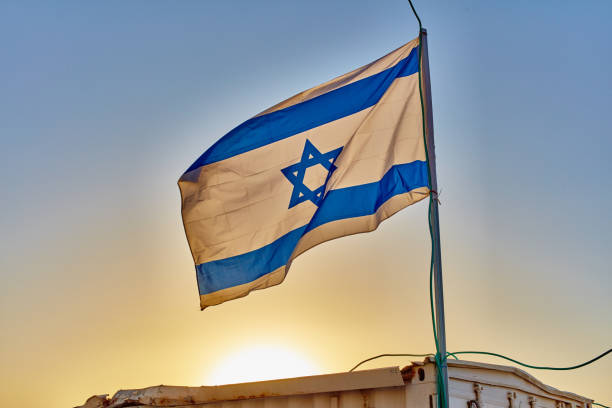 istock Israel flag at sunset 668033692