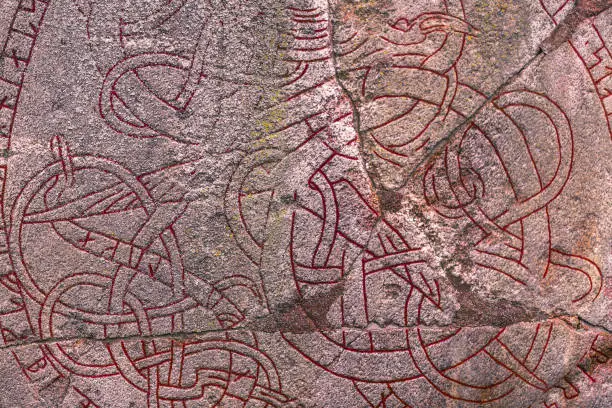 Skanela, Sweden - April 1, 2017: Viking runestone in Skanela Church, Sweden