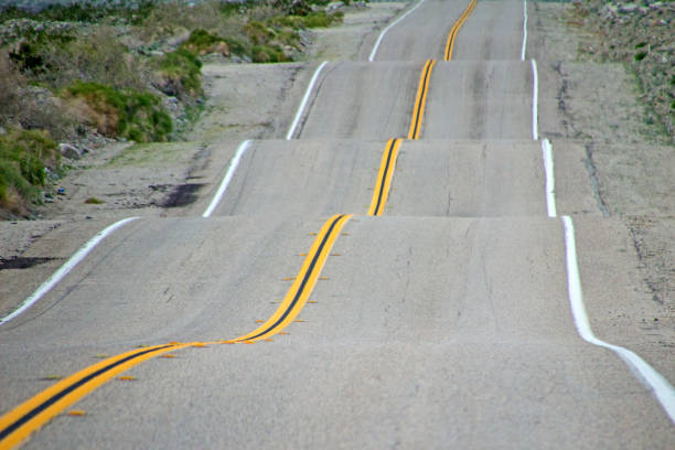 でこぼこ road - bumpy ストックフォトと画像