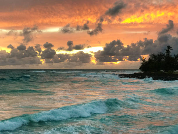 istock Hawaiian Sunset at Poipu Beach Kauai 668046208