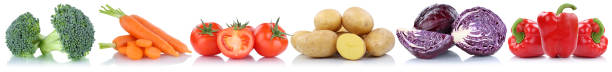 istock Vegetables tomatoes carrots potatoes bell pepper in a row isolated 668053074