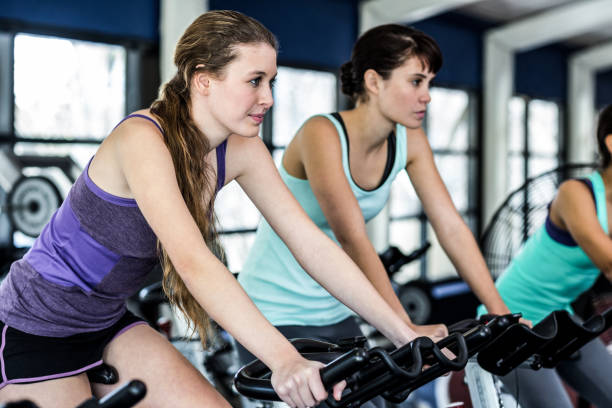 istock Fit woman working out at exercising class 668054160
