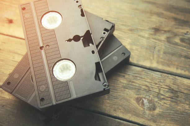 istock old retro video tape over wooden background 668054288