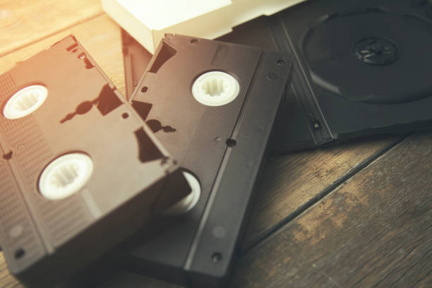 istock old retro video tape over wooden table background 668054360