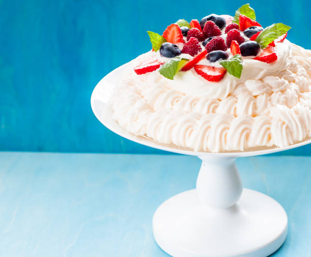 istock Pavlova: Meringue Whipped Cream, and Fresh Berries 668064402