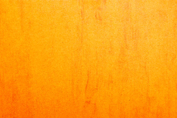 istock Background of orange paper 668086902