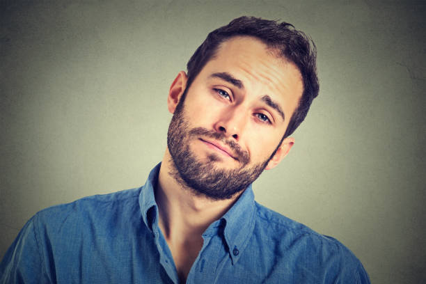 istock portrait of sad man 668093178