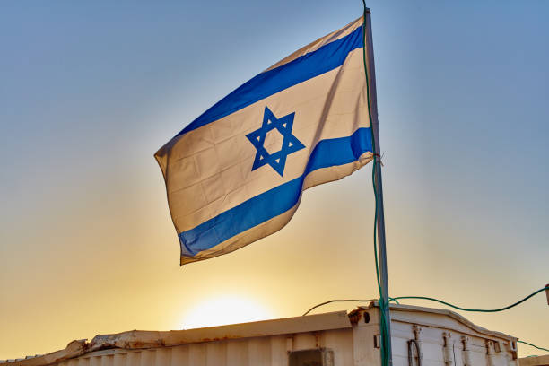 istock Israel flag at sunset 668099920