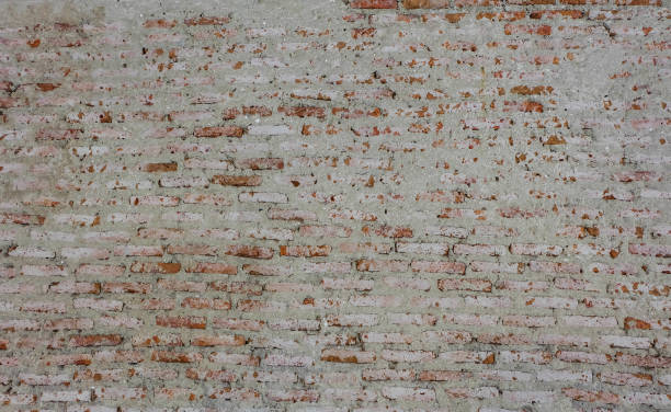 istock white and red brick wall texture or background, close up 668116396