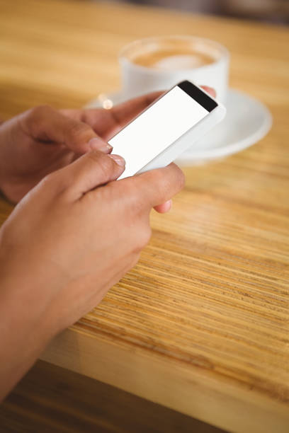 istock A beautiful businesswoman using a smartphone 668124410