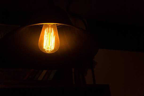 istock Light bulbs In the storage room at night 668126940