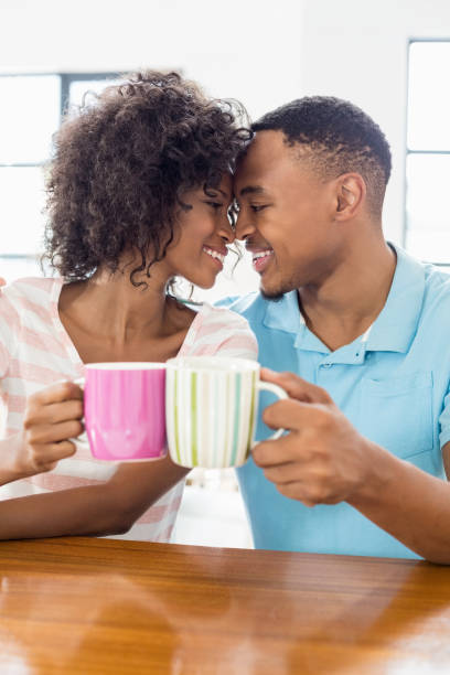 istock Happy couple toasting coffee mug 668129572