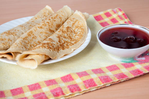 istock Delicious pancakes on a plate with strawberry jam 668132582