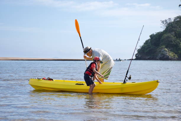 istock Father and Son Sea Kayaking 668133886