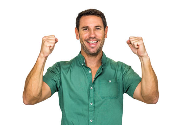 istock Happy man rejoicing raising fists 668143844