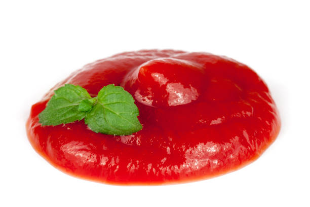 istock Tomato ketchup isolated on white background 668144576