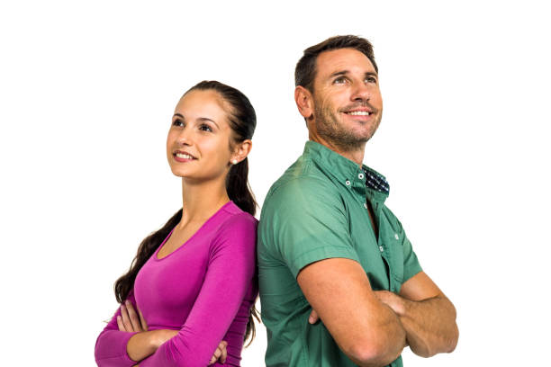 istock Thoughtful couple standing back to back looking away 668144772