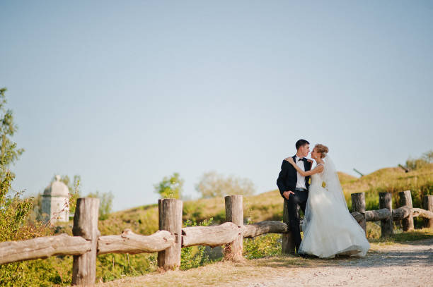 istock fascinating  wedding couple on sunshine 668154772