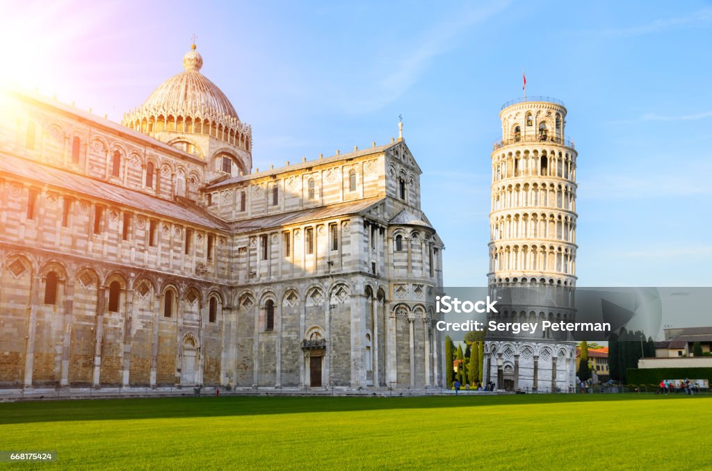 Leaning Tower of Pisa at sunset Sunset view of Leaning Tower of Pisa and Cathedral, Tuscany, Italy Leaning Tower of Pisa Stock Photo