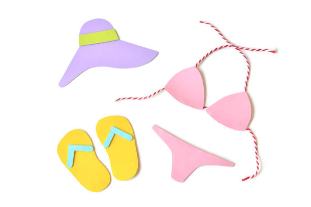 istock Summer clothes and accessories paper cut on white background - isolated 668175564