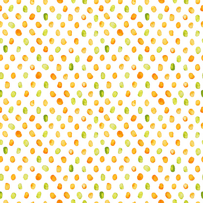 Seamless dots pattern. Yellow and orange circles. Polka dots pattern. Ink illustration. Hand drawn ornament for wrapping paper.