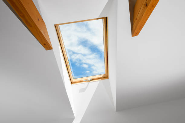 Roof Window And Blue Sky stock photo