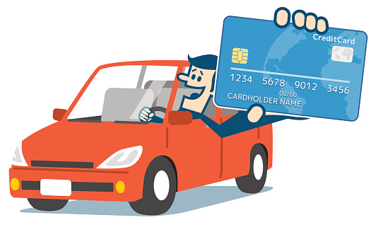 Man in car and credit card.