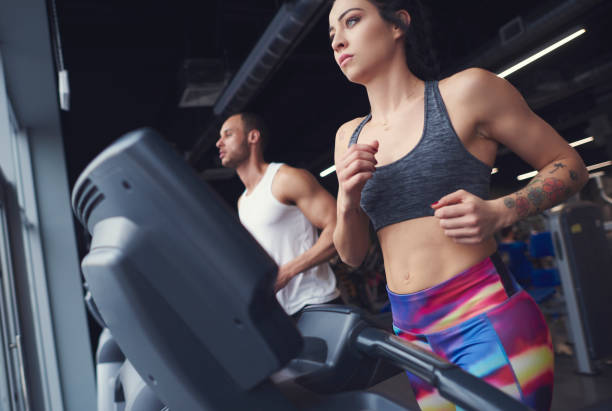 istock Low angle view of running young athletes 668182146
