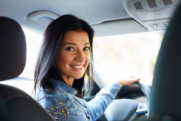 istock Woman sitting in a car 668197172