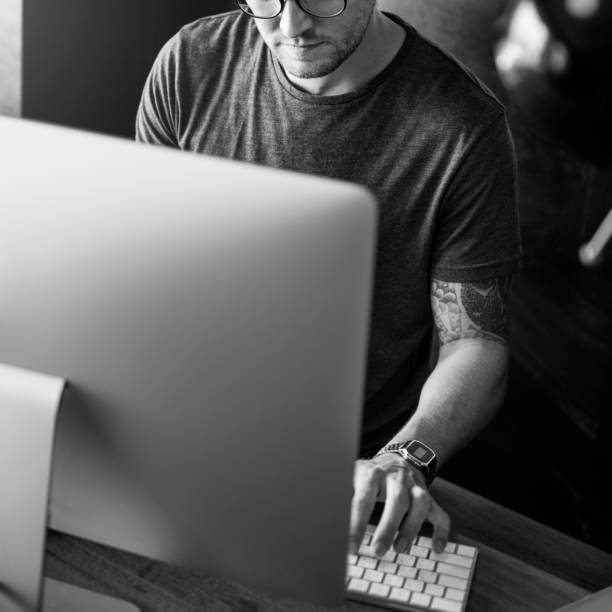 istock Man Busy Photographer Editing Home Office Concept 668209020