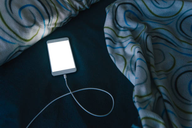 智慧手機在床上 - redes sociales 個照片及圖片檔