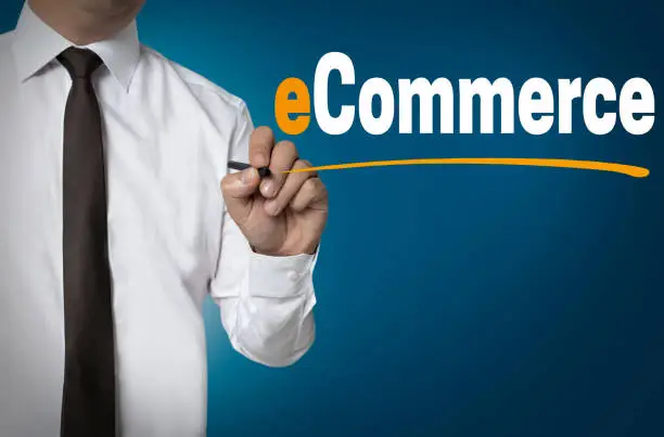 e commerce is written by businessman background concept.