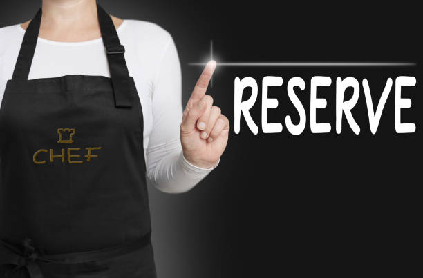 istock Reserve touchscreen is operated by chef concept 668212190