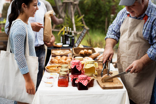 People at healthy local food festive People at healthy local food festive local products stock pictures, royalty-free photos & images