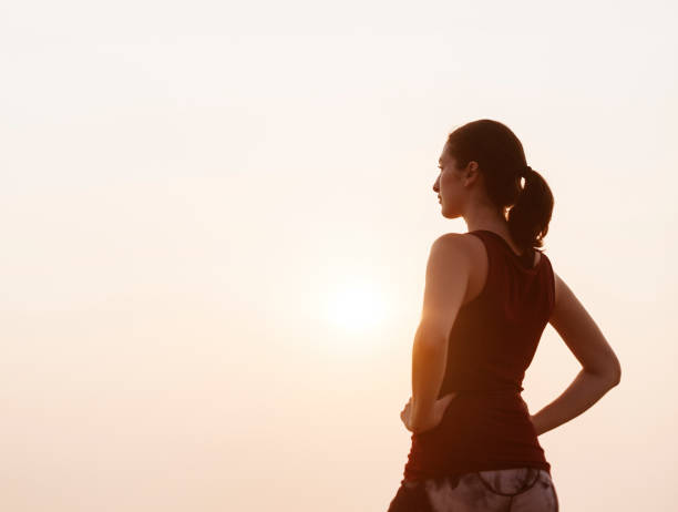istock Stretching Exercise Training Healthy Lifestyle Beach Concept 668214738